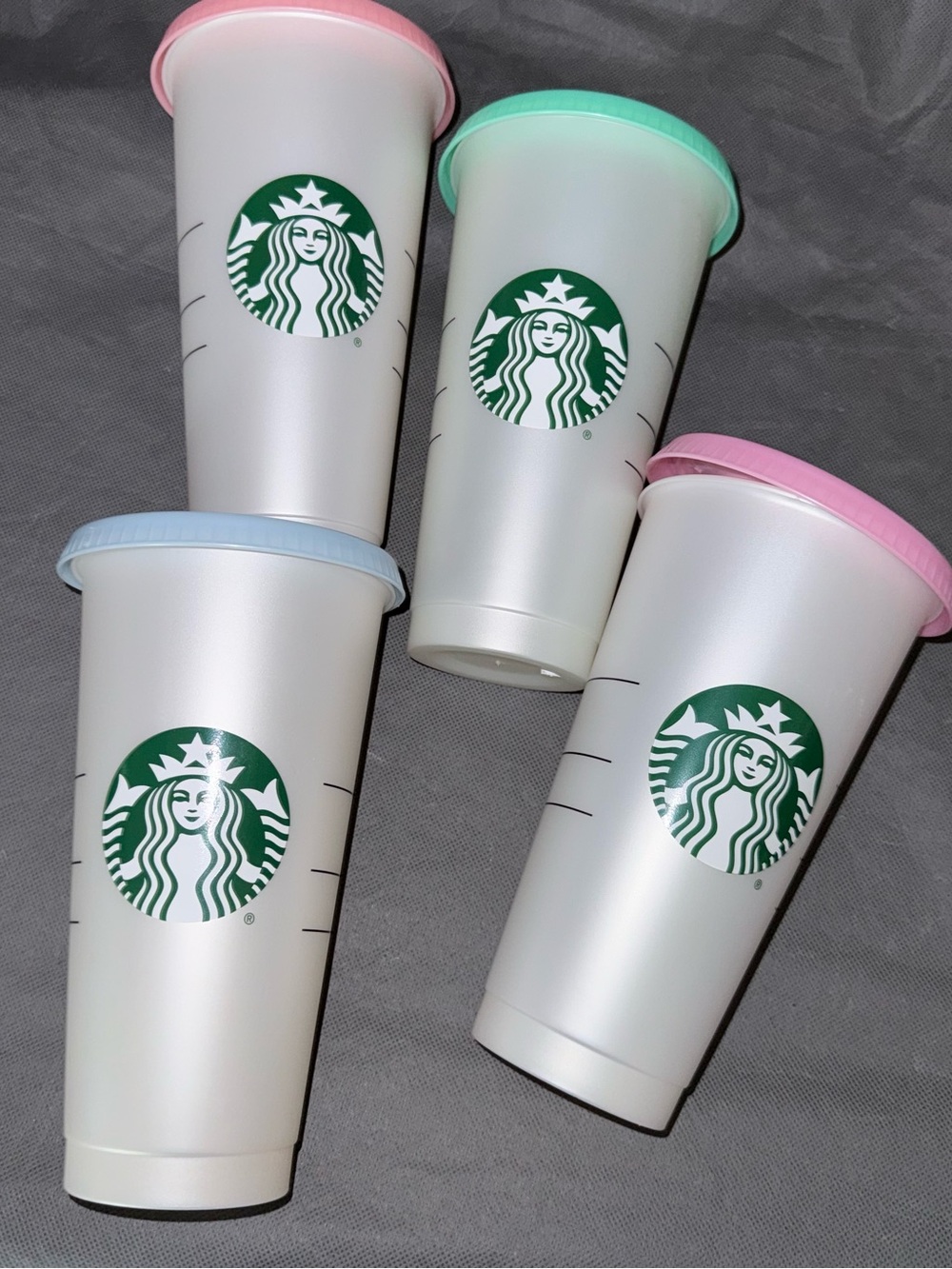 Starbucks Set of 4 Reusable Cups 24oz Pastel Lids Flat